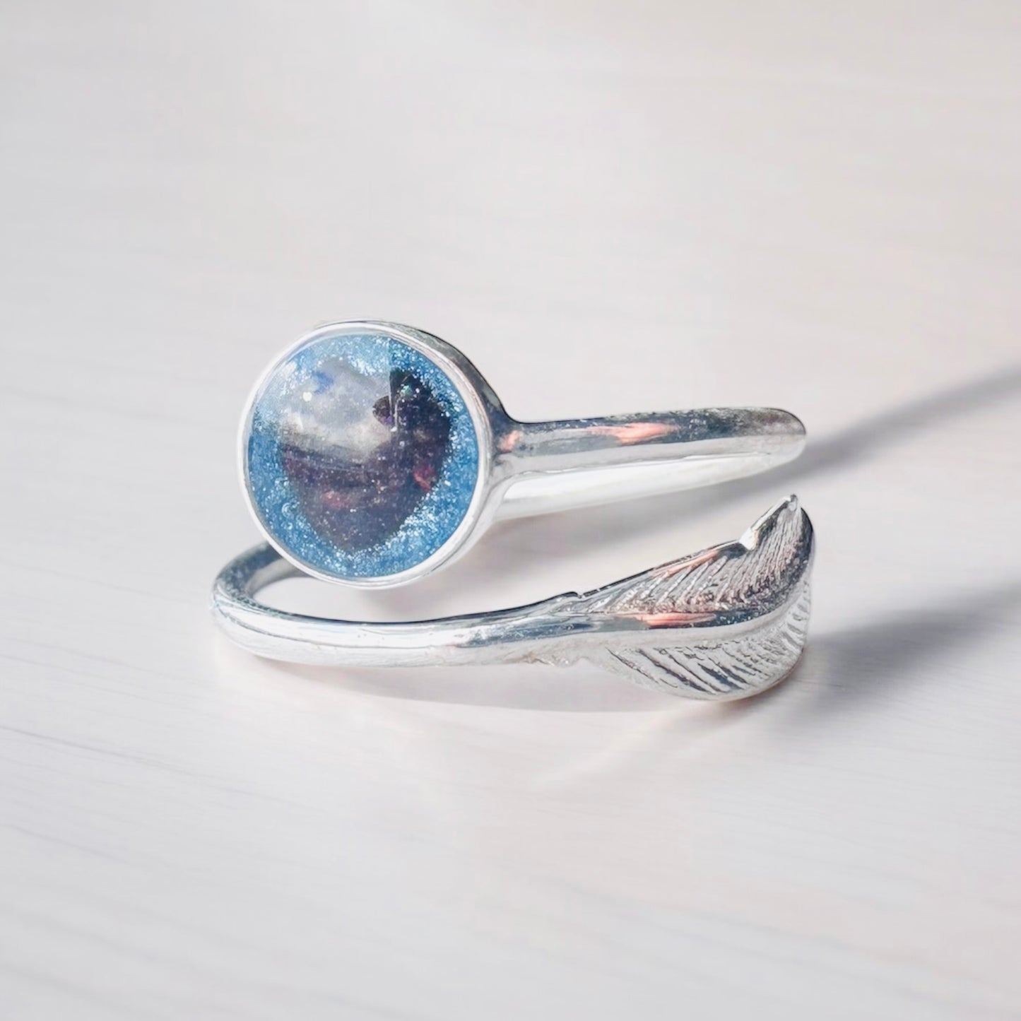 Adjustable feather ring
