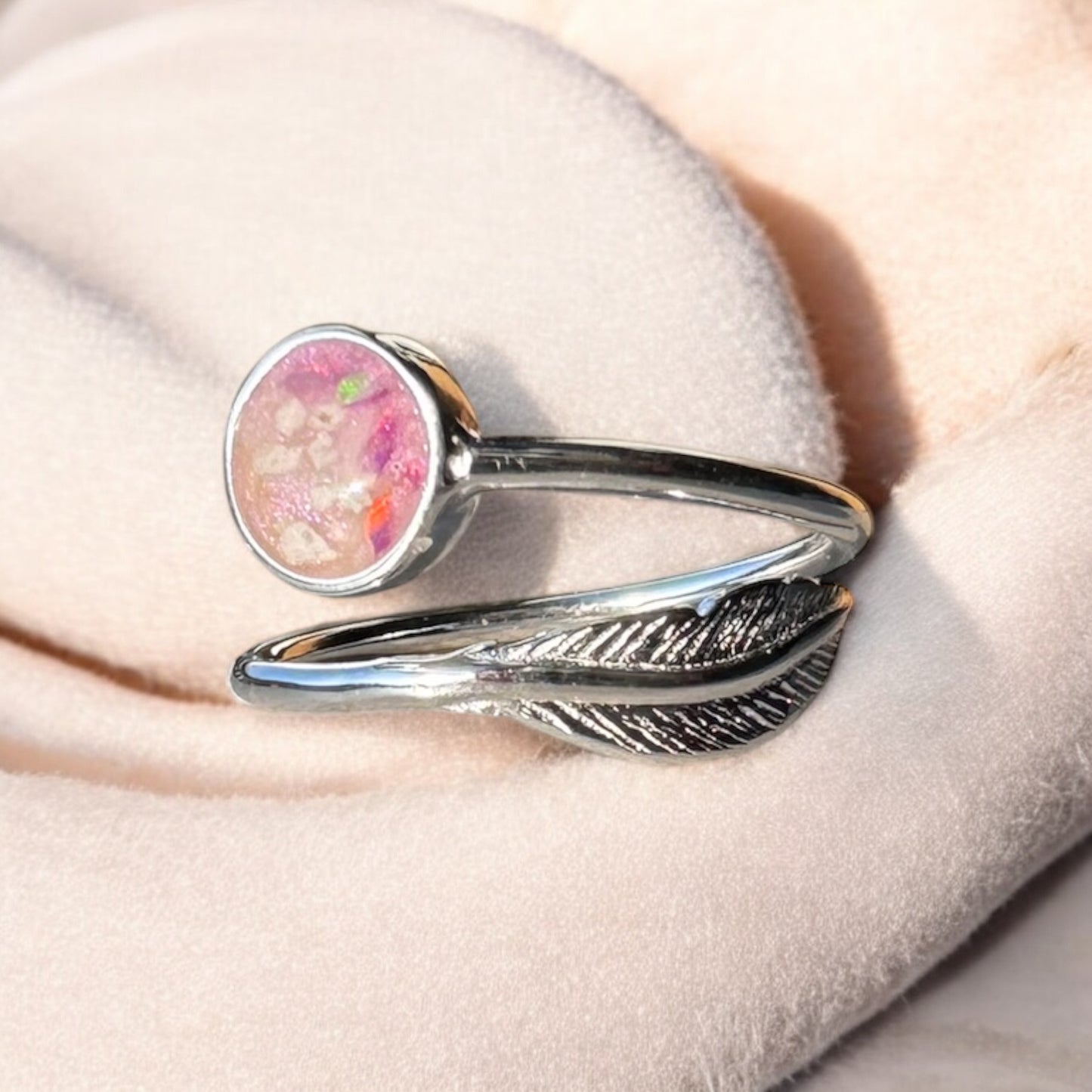 Adjustable feather ring