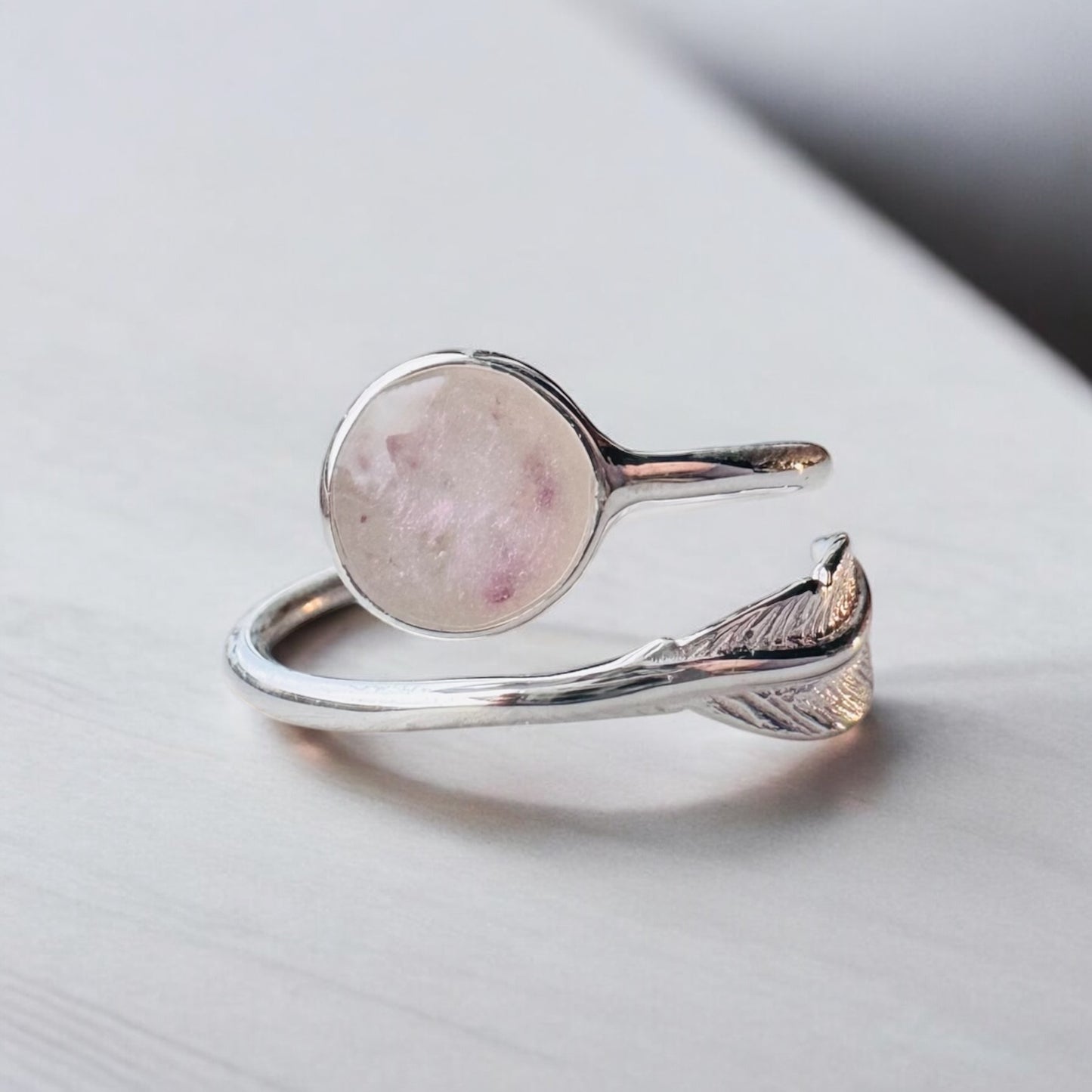 Adjustable feather ring