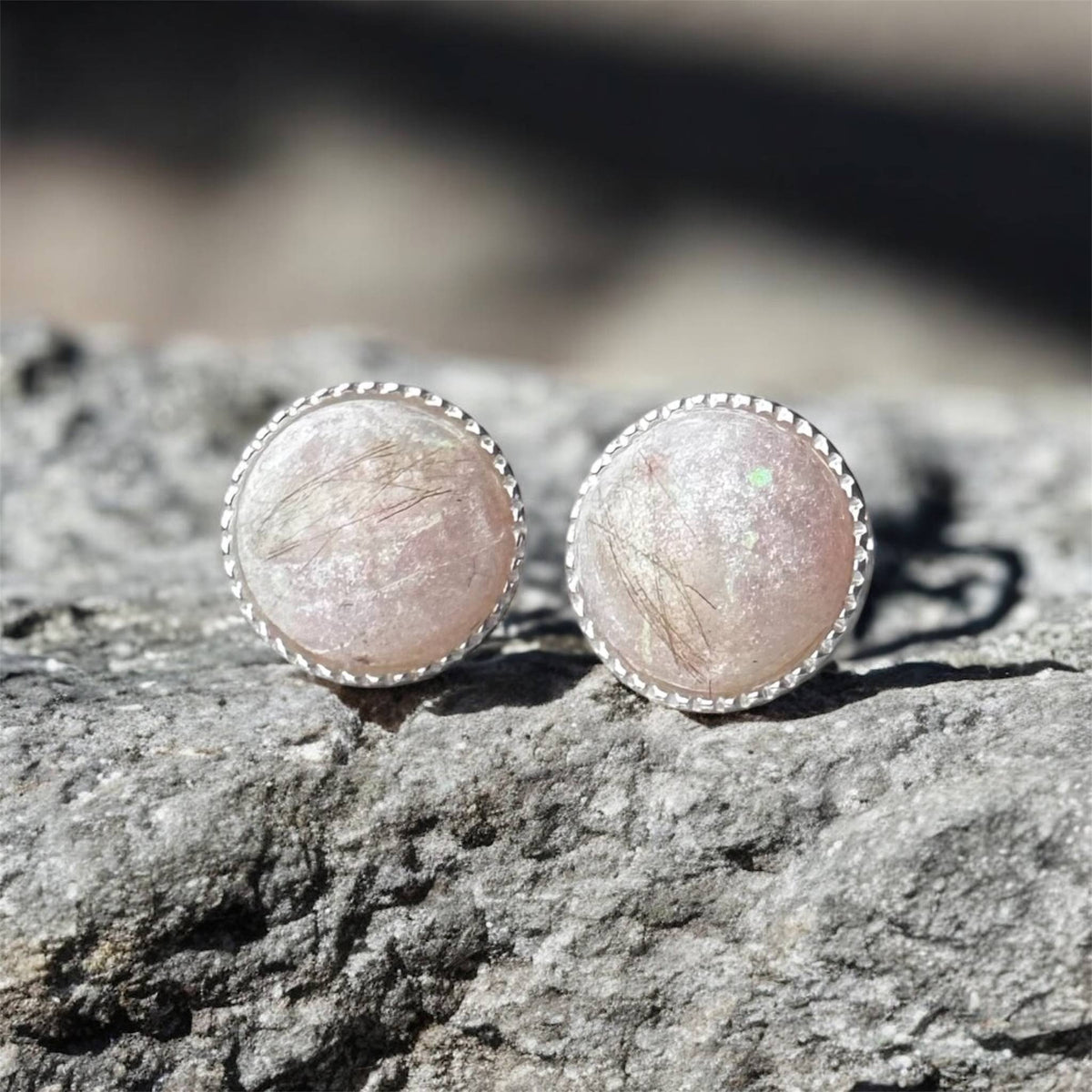 Sterling silver 8mm keepsake earrings featuring personalised resin settings with breastmilk, umbilical cord, hair and fur or placenta